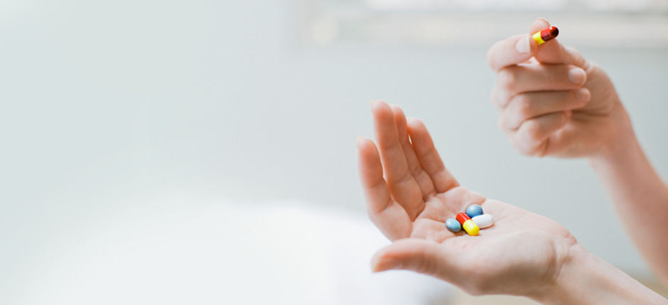 Hand mit Tabletten